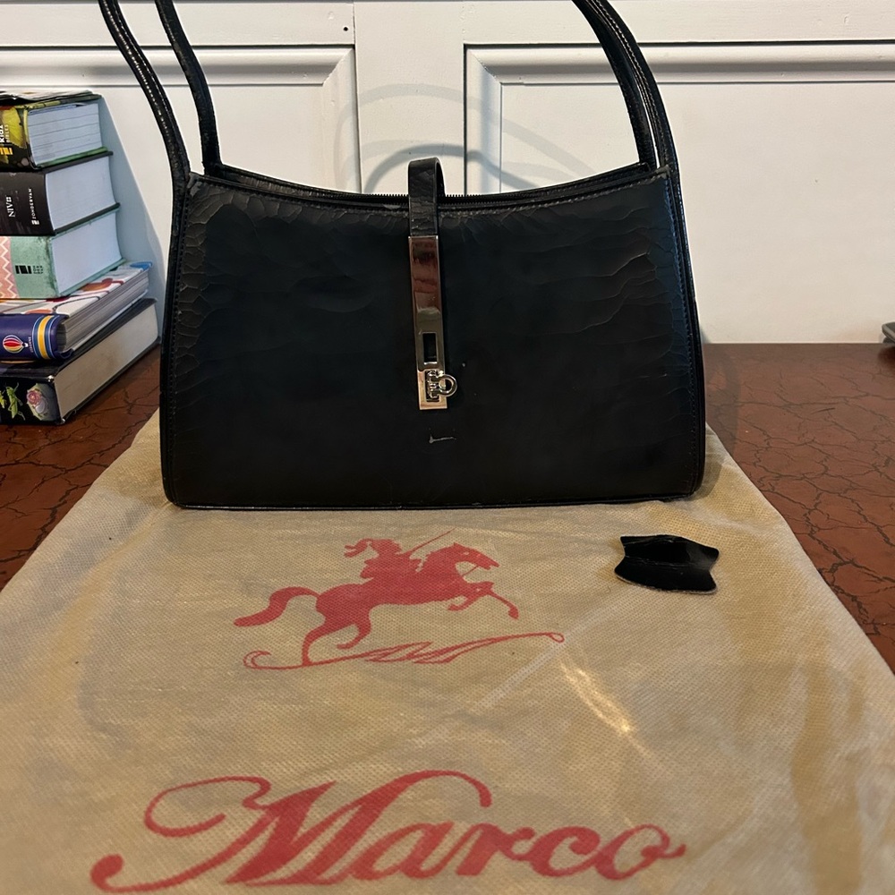 Black Leather Marco Polo Handbag with Silver Accent. Excellent condition.